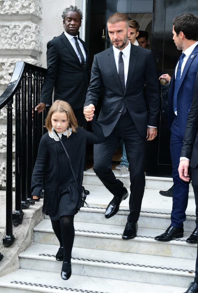David Beckham and his daughter Harper leave the show