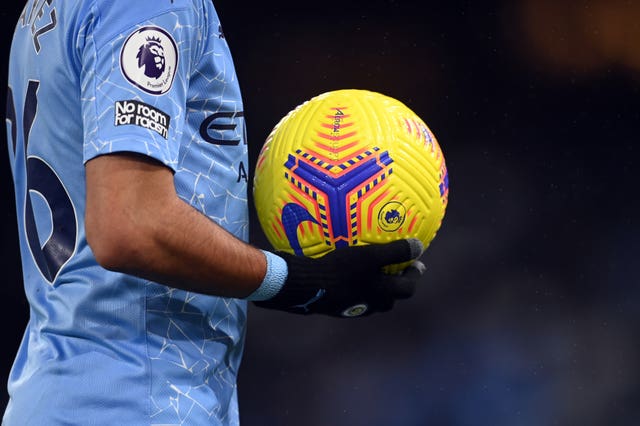 Riyad Mahrez leaves with the match ball