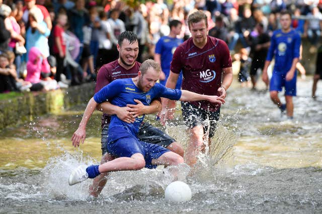Annual Football in the River match