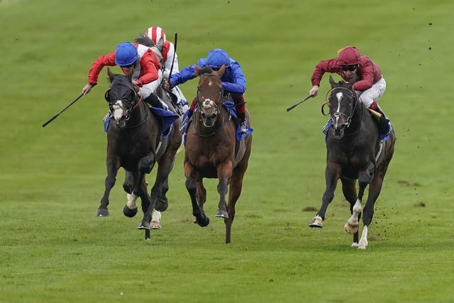 Kameko (right) saw off Benbatl (centre) and Regal Reality to win the day
