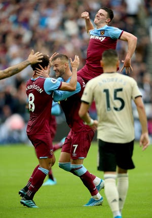 Andriy Yarmolenko celebrates the opening goal