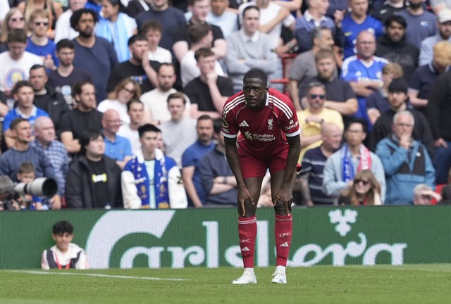 Liverpool defender Ibrahima Konate stands with his hands on his knees