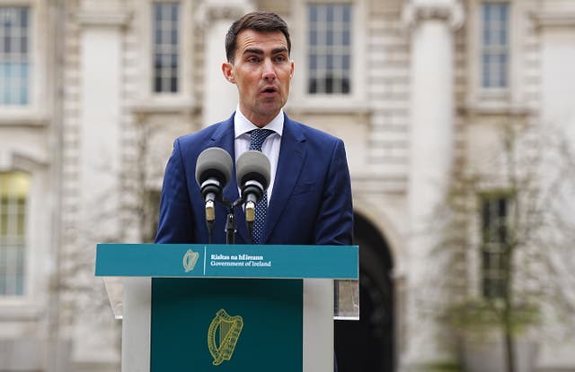 Jack Chambers speaking from a lectern outside Government Buildings