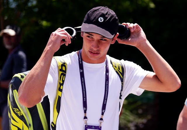 Oliver Tarvet puts on his headphones