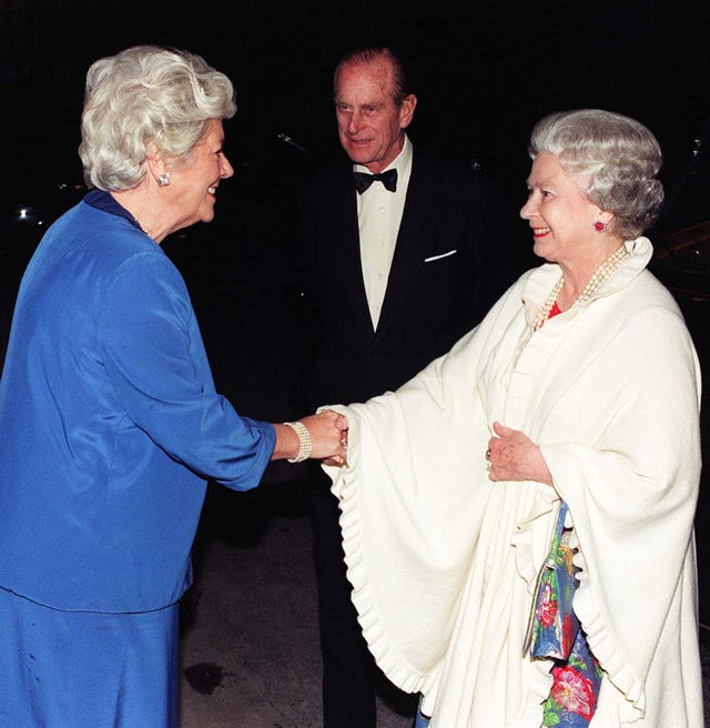The Queen accompanied by the Duke of Edinburgh being welcomed to the Palace of Westminster in 1996