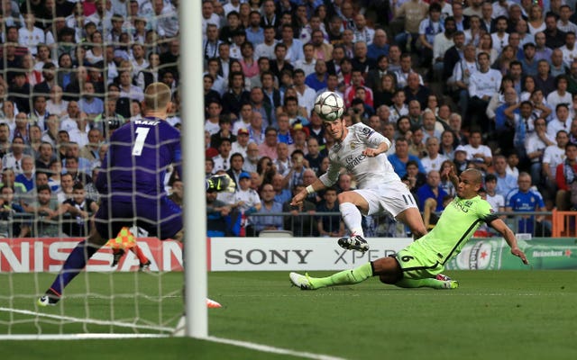 Gareth Bale, centre, scores for Real Madrid against Manchester City in 2016