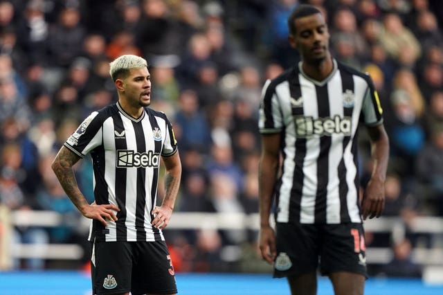 Bruno Guimaraes, left, and Alexander Isak stand dejected during Newcastle’s December 2023 Premier League defeat to Nottingham Forest