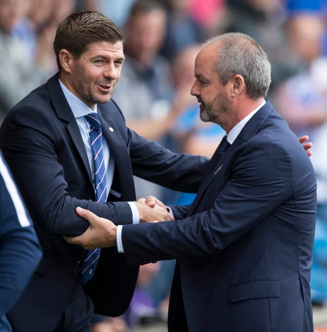 Steven Gerrard and Steve Clark in a friendlier moment