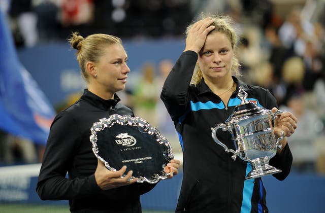 Kim Clijsters, right, defeated Russia's Vera Zvonareva 6-2 6-1 to win her second US Open singles title in 2010