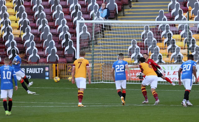 Rangers' James Tavernier scores from the spot against Motherwell 