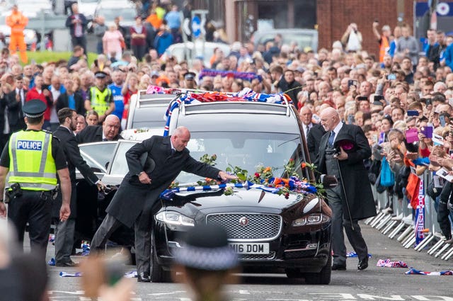Thousands gathered outside Ibrox for the funeral procession of  Fernando Ricksen