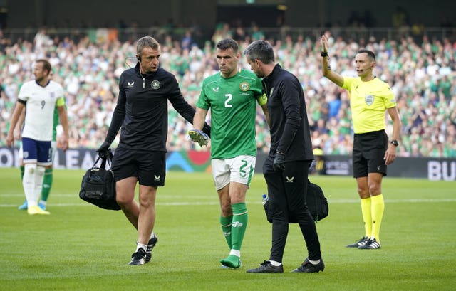 Republic of Ireland’s Seamus Coleman leaves the game against England after picking up an injury