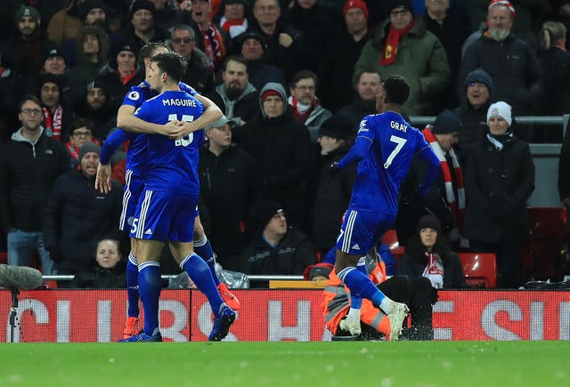 Harry Maguire, front left, celebrates scoring Leicester's equaliser at Anfield in January 2019