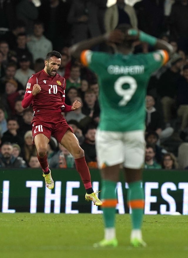 Republic of Ireland striker Michael Obafemi reacts to Artak Dashyan's goal
