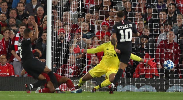 Kylian Mbappe, right, scores PSG’s second goal