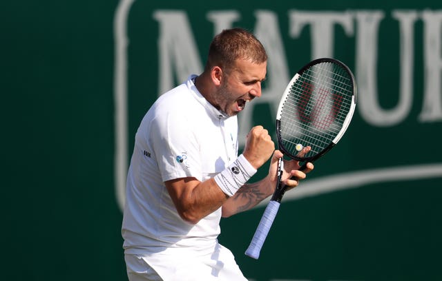 Dan Evans reacts after winning the match