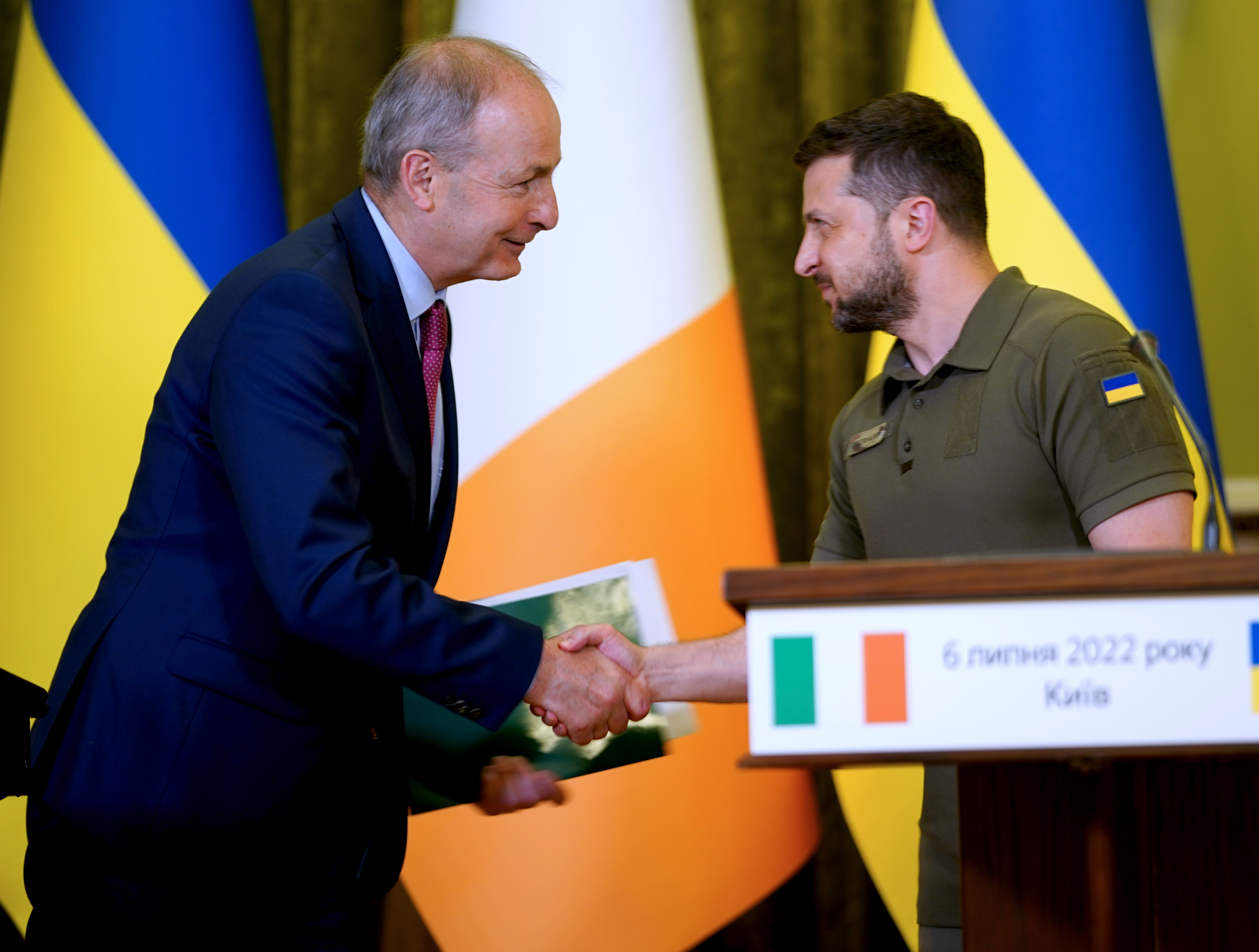Taoiseach Micheal Martin and Ukrainian President Volodymyr Zelensky shake hands in 2022