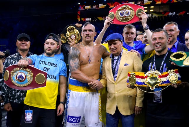 Oleksandr Usyk celebrates