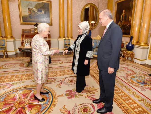 President of Turkey Recep Tayyip Erdogan and his wife Emine meet the Queen at Buckingham Palace (John Stillwell/PA)