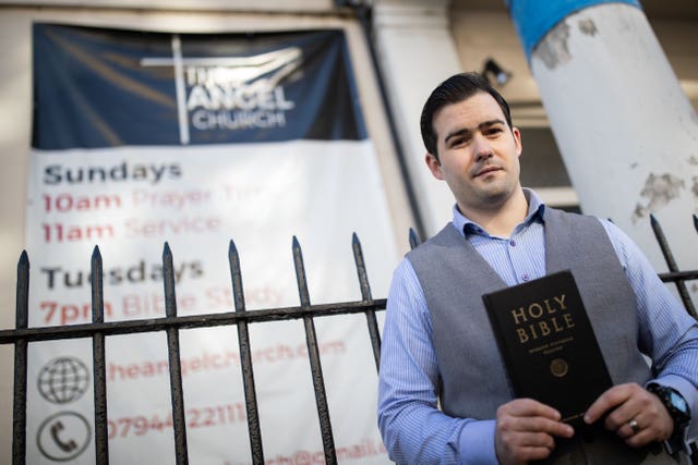 Pastor Regan King outside the church