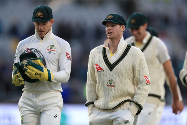 Tim Paine (left) has not used DRS well
