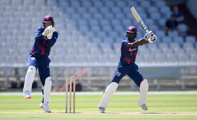 West Indies' Shamarh Brooks bats watched on by Joshua Da Silva 