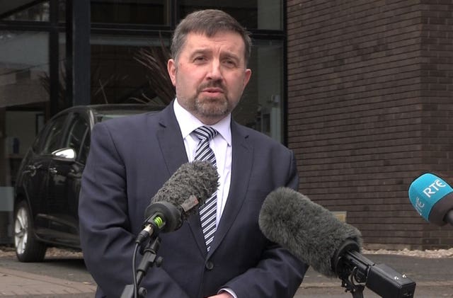 Robin Swann briefs the media