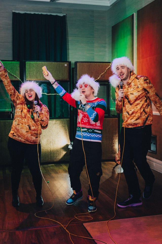 Mark, right, and Roxanne Hoyle with Ed Sheeran