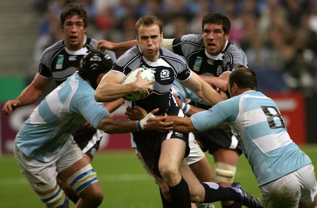 Mike Blair, centre, made 85 appearances for Scotland (Anthony Devlin/PA)