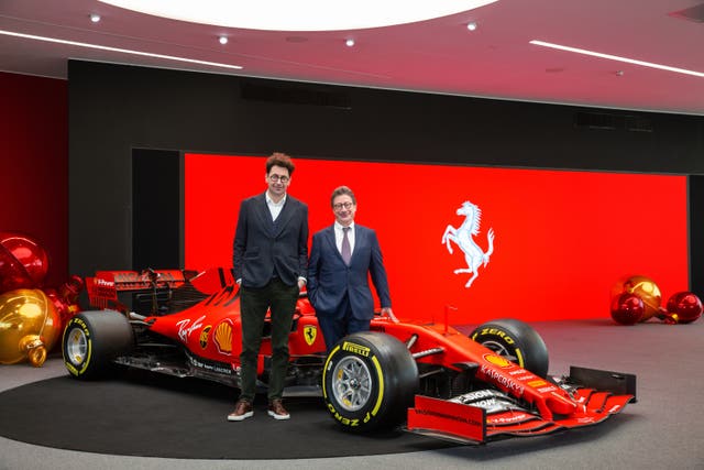 Ferrari team principal Mattia Binotto, left, and Ferrari chief executive Louis Camilleri, right, have work to do