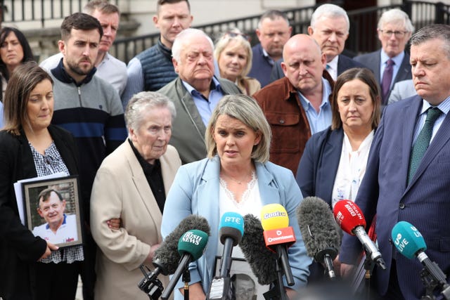 Sean Brown's daughter Clare Loughran speaks to reporters outside court