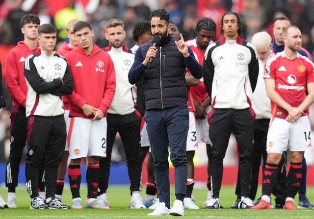 Ruben Amorim (centre right) speaks the crowd