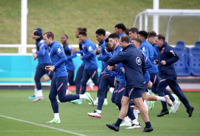 England captain Harry Kane (left) during a training session at St George's Park