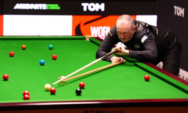 Mark Williams plays a shot at the 2025 World Snooker Championship