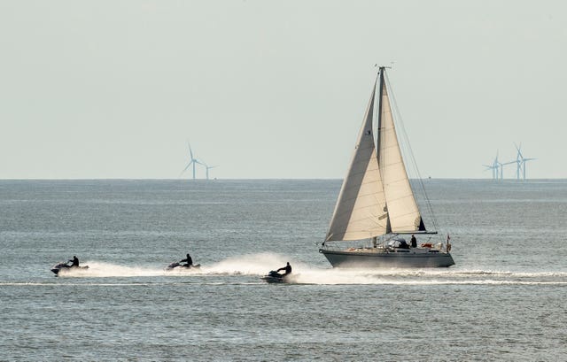 Water sports fans enjoy the warm weather