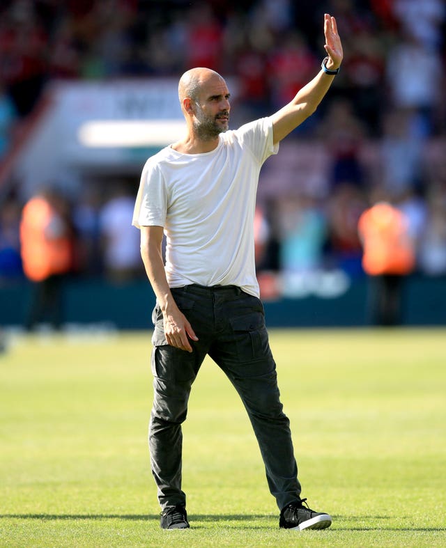 Manchester City manager Pep Guardiola acknowledges the fans