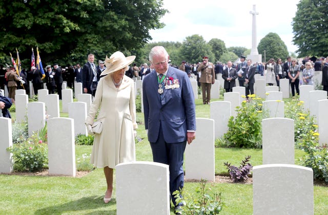 Charles and Camilla at the Commonwealth War Graves Commission cemetery in Bayeux