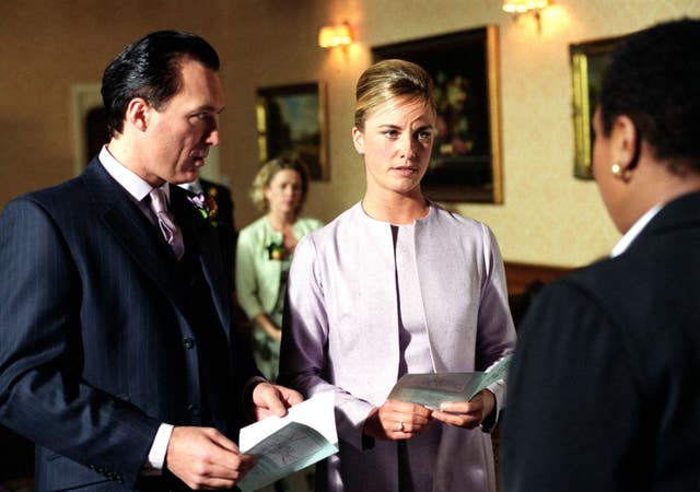 Steve (Martin Kemp) and Mel (Tamzin Outhwaite) preparing to take their vows