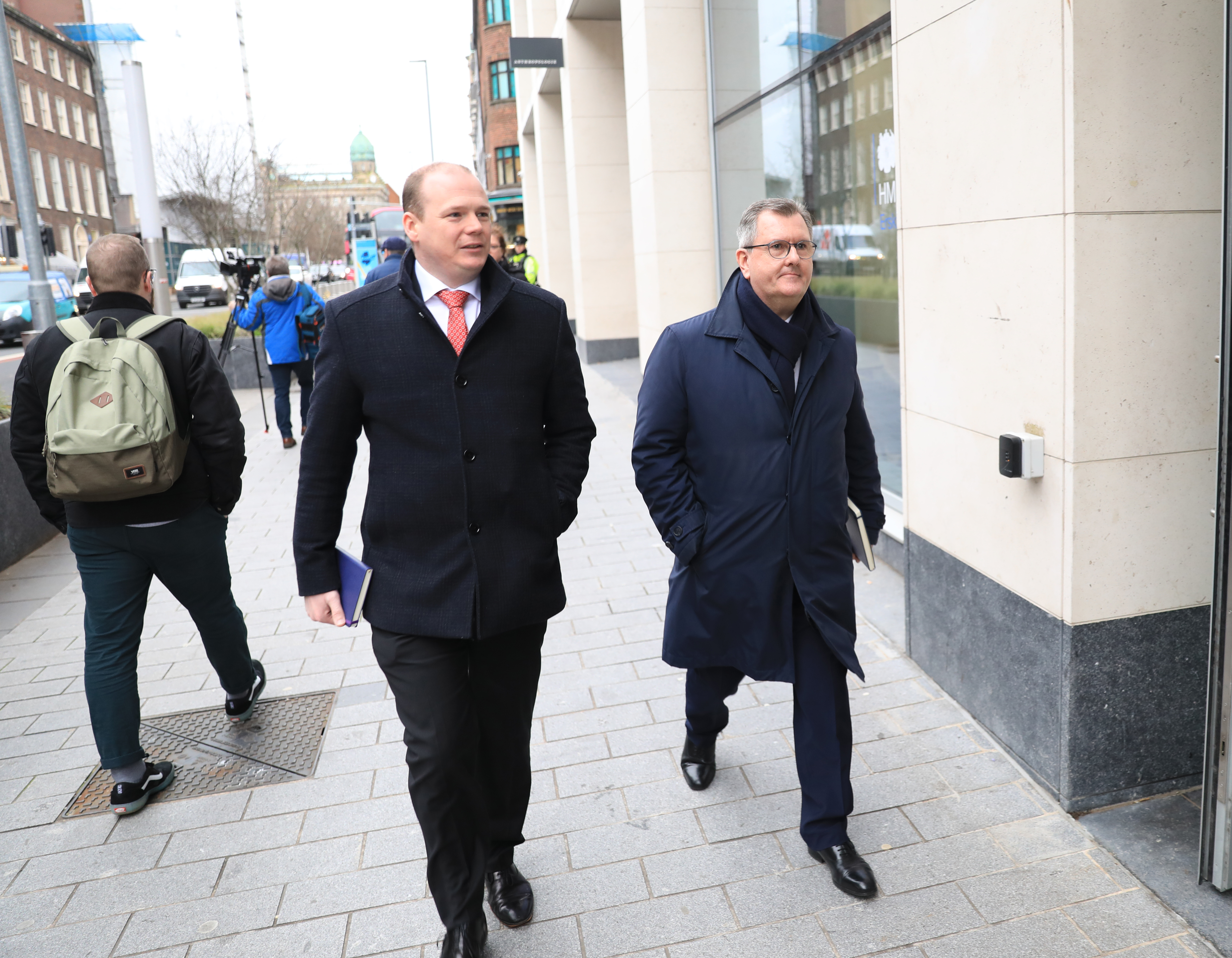 DUP leader Sir Jeffrey Donaldson, right, and party member Gordon Lyons MLA arrive at government buildings in Belfast city centre to discuss the impact of the Northern Ireland Protocol with Foreign Secretary James Cleverly, Northern Ireland Secretary Chris Heaton-Harris and other political party on Wednesday