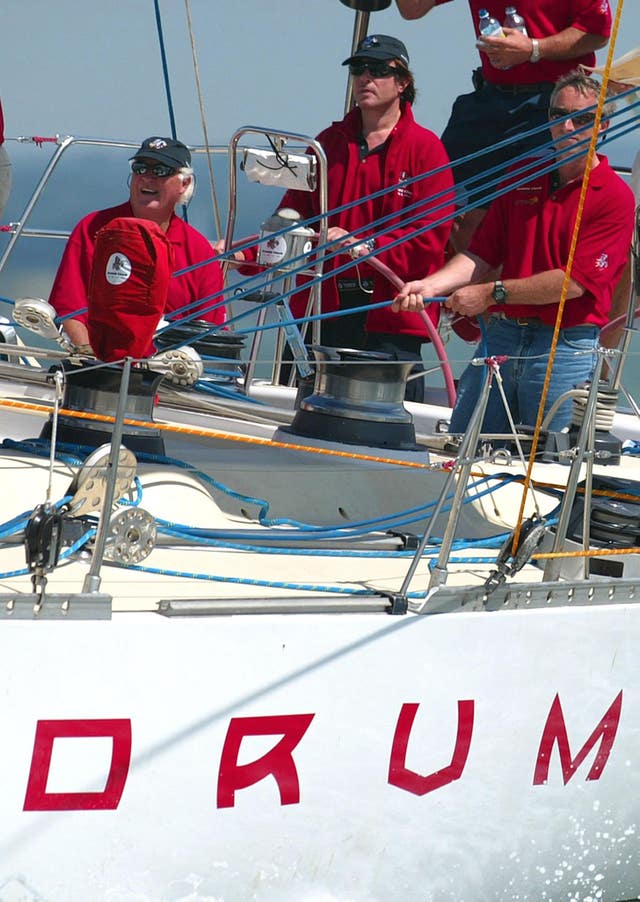 Duran Duran lead singer Simon Le Bon at the helm of his yacht Drum during the start of the Fastnet race from Cowes
