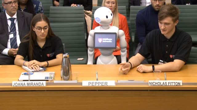  Pepper the robot, appearing before a select committee for the first time (PA )