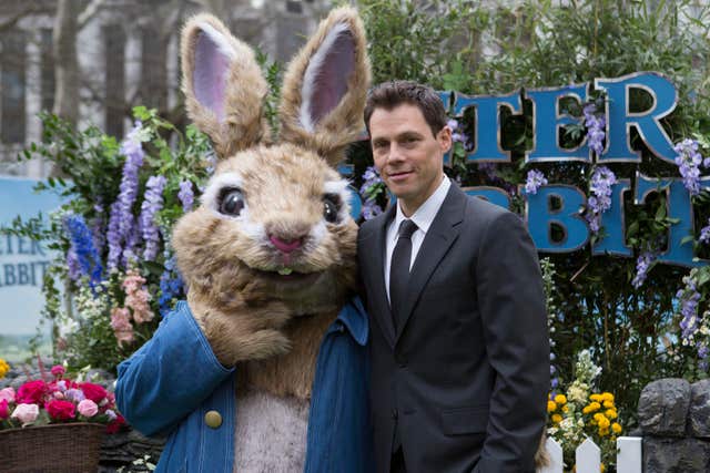Peter Rabbit's director Will Gluck with the star of the show (Rick Findler/PA)
