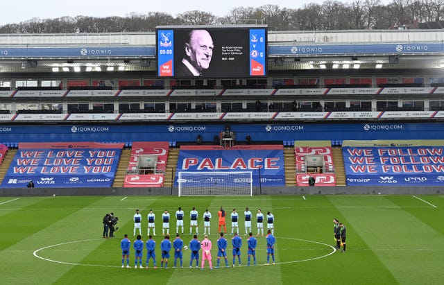 Crystal Palace and Chelsea players stand for a two minute silence prior to kick-off
