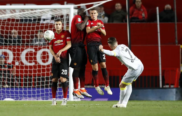 Derby's Harry Wilson fires home a free-kick at Old Trafford
