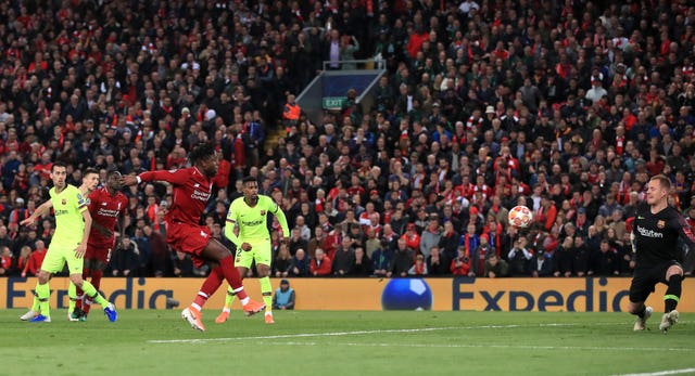 Liverpool's Divock Origi converted Trent Alexander-Arnold's clever corner to put his side in front on a famous night at Anfield 