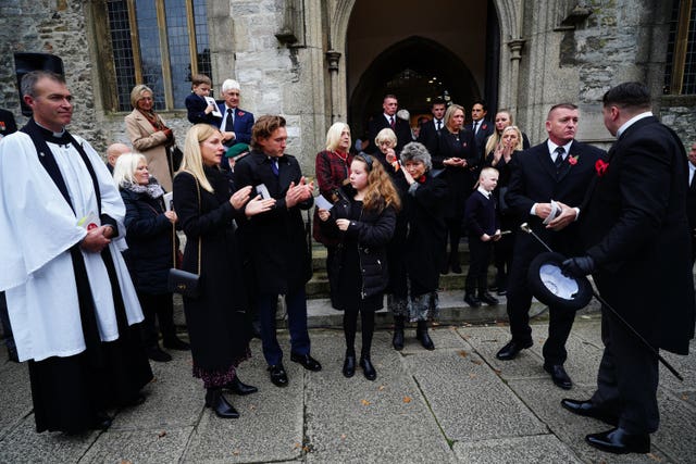 Mourners leave the funeral of Dennis Hutchings, who died after contracting Covid-19 while he was in Belfast to face trial over a fatal shooting incident in Co Tyrone in 1974, at St Andrew’s Church in Plymouth