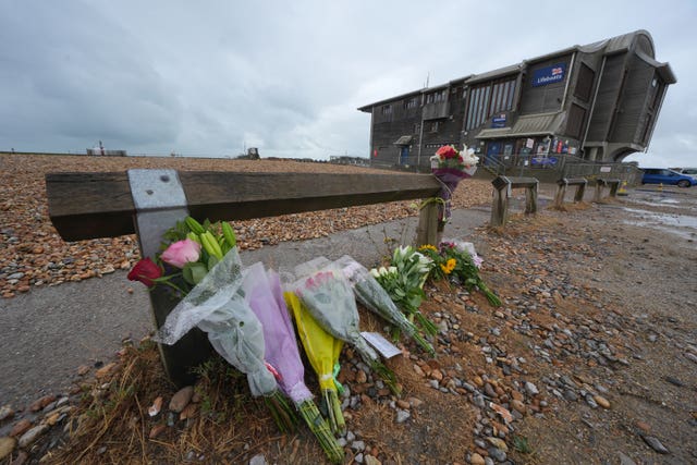 Floral tributes on the beach at Shoreham-by-Sea, West Sussex