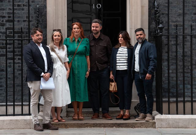 Families of the victims of the Southport attack (l to r) Chris Long and Jenni Stancombe, uncle and mother of Elsie Dot Stancombe, Lauren and Ben King, parents of Bebe King, and Alexandra Aguiar and Sergio Aguiar, parents of Alice Aguiar outside 10 Downing Street