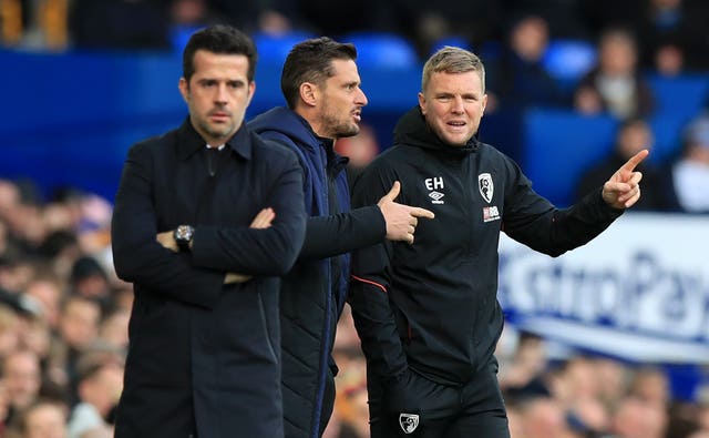 Eddie Howe, right, gestures on the touchline