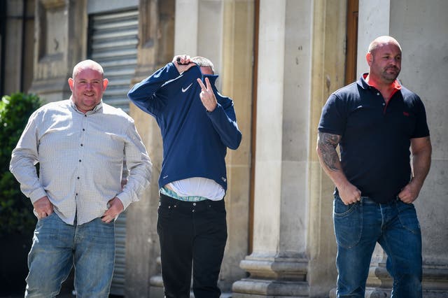 Liam Judge, left, Thomas Lynch and Matthew Evans, right, arrive at court